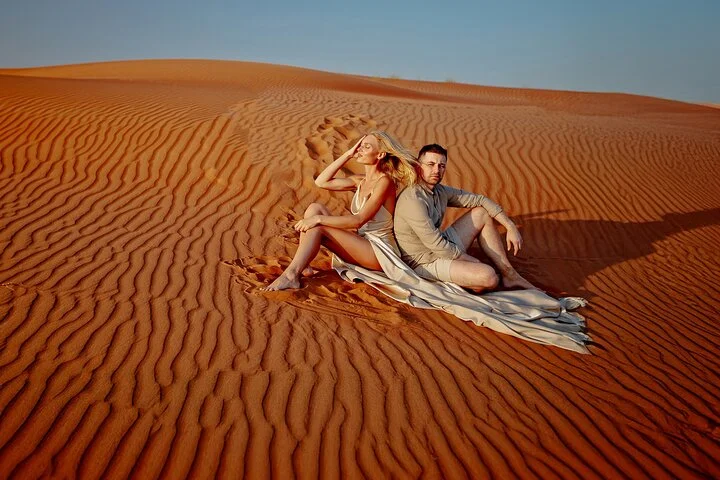 Evening Desert Safari Camel, Falcon, Sandboarding BBQ & Shows