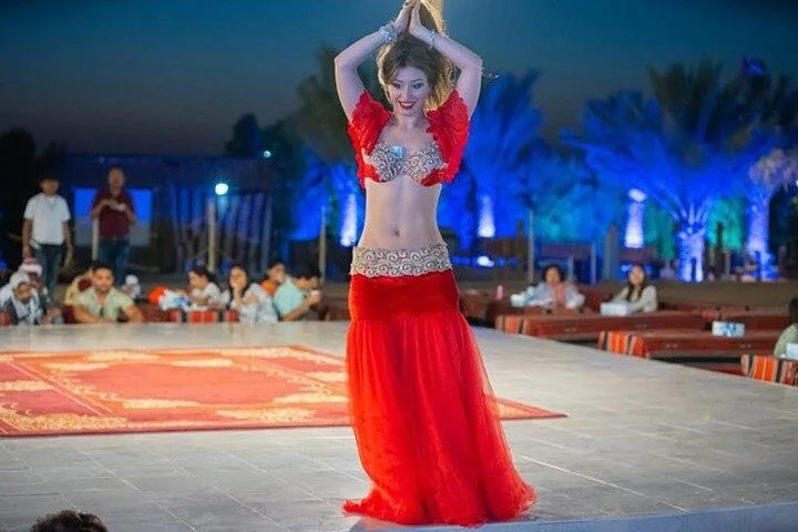 Evening Desert Safari with BBQ Dinner, Sandboarding and Camel Ride Experience