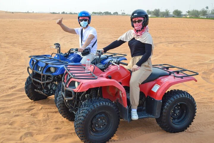 Evening Desert Safari with Quad Bike, BBQ Dinner and Camel Ride