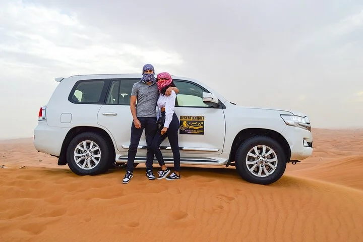 Evening Desert Safari with Quad Bike, BBQ Dinner and Camel Ride