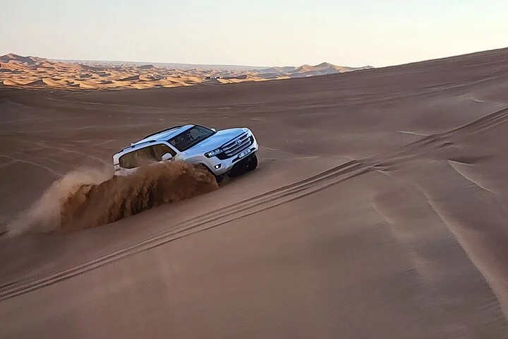 Evening Dubai Desert Safari with Quad Biking & Sandboarding