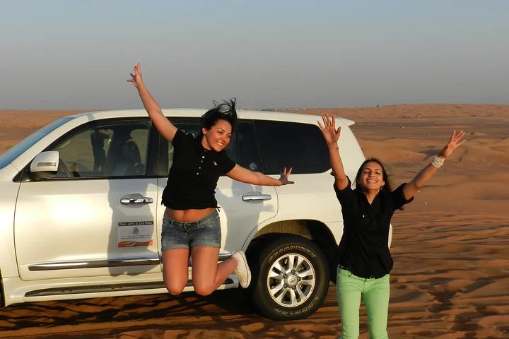 Evening Dubai Desert Safari with Quad Biking & Sandboarding