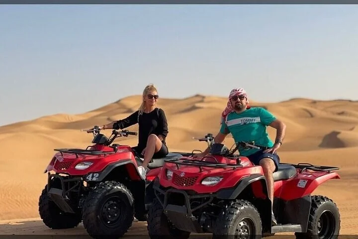 Experience Evening Desert Safari with BBQ Dinner in Dubai