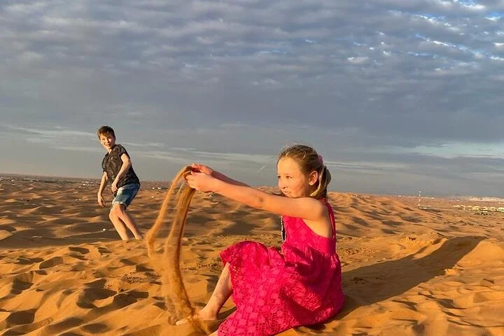 Morning Desert Safari: Dune Bashing, Camel Ride & Sandboarding