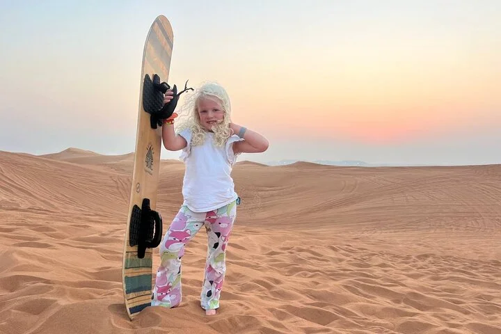 Morning Desert Safari with Quad Bike, Camel Ride & Sandboarding