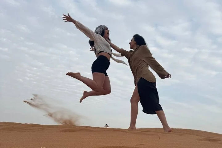 Morning Desert Safari with Quad Bike, Camel Ride & Sandboarding