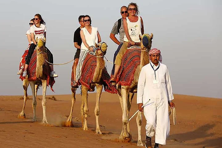 Morning Desert Safari with Quad Bike, Camel Ride & Sandboarding