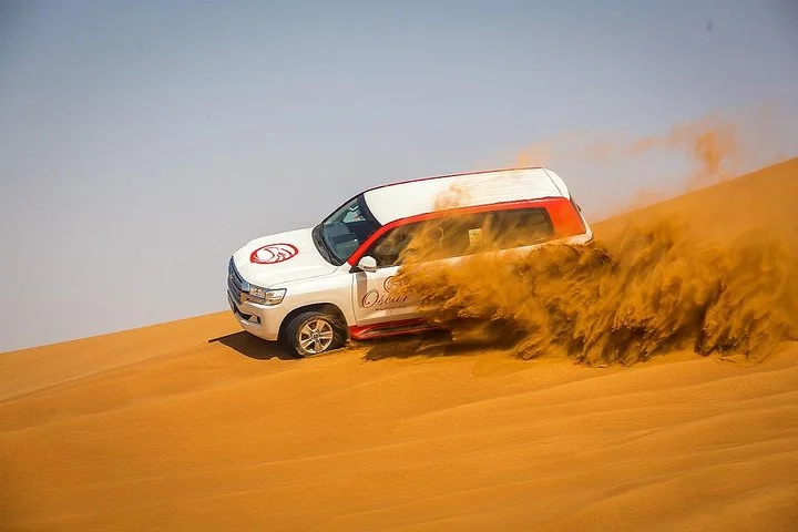 Morning Red Dunes with Camel Ride, Sandboarding and Refreshments