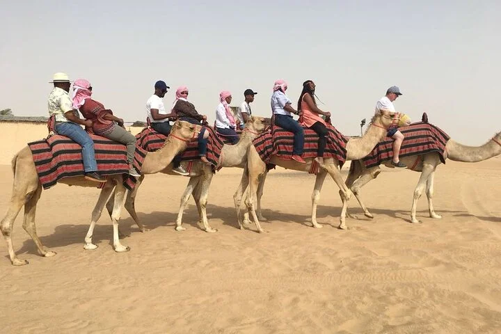 Morning Red Dunes with Camel Ride, Sandboarding and Refreshments