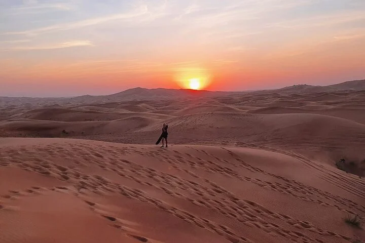 Morning Thrilling Dune bashing , Send Boarding & Camel ride