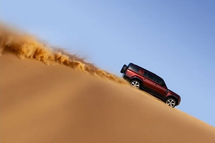 Morning Thrilling Dune bashing , Send Boarding & Camel ride