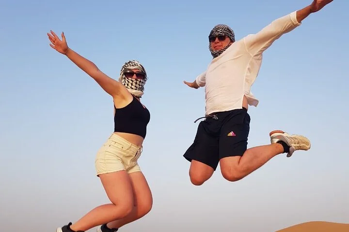 Morning Thrilling Dune bashing , Send Boarding & Camel ride