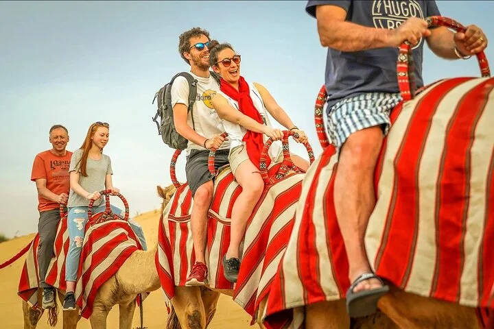 Premium Desert Safari with Quad Bike Red Dunes Camel Ride Dinner