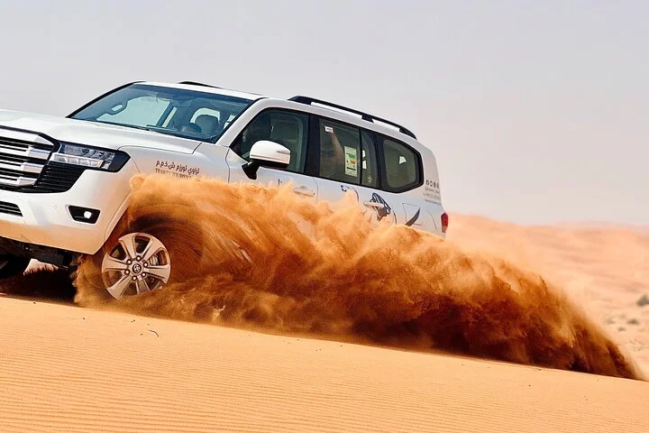 Premium Dubai Desert Sunrise with Dune Bashing & Camel Ride