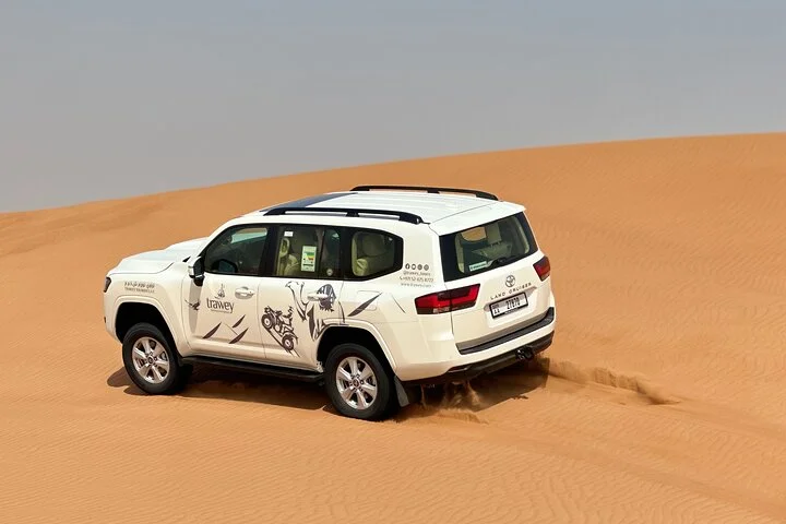 Premium Dubai Desert Sunrise with Dune Bashing & Camel Ride