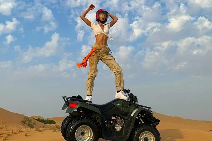 Premium Evening Desert Safari with Quad Bike, Camel Ride and BBQ Dinner