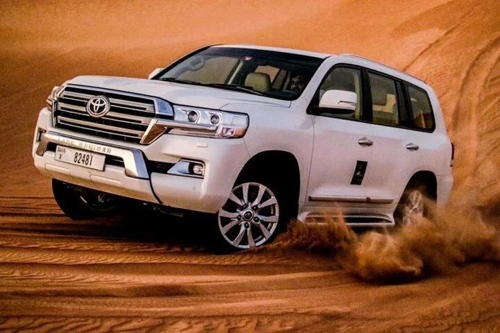 Premium Evening Desert Safari with Quad Bike, Camel Ride and BBQ Dinner