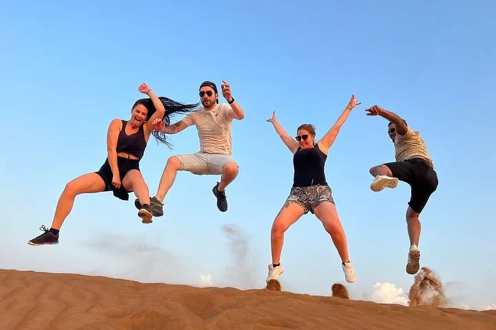 Private Evening Desert Safari with BBQ Dinner, Camel Ride And Sand Boarding