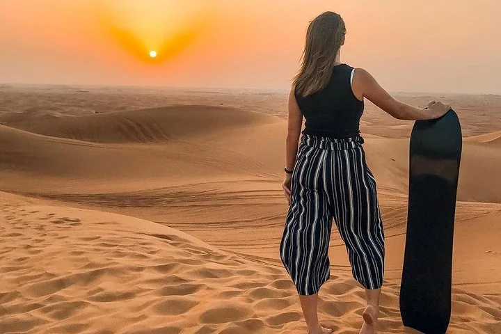 Private Evening Desert Safari with BBQ Dinner, Camel Ride And Sand Boarding