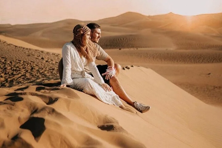 Private Evening Desert Safari with BBQ Dinner, Camel Ride And Sand Boarding