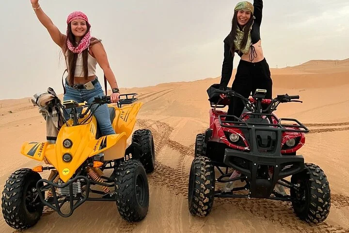 Quad Biking Dubai With Desert Safari Dune Bashing Camel Ride