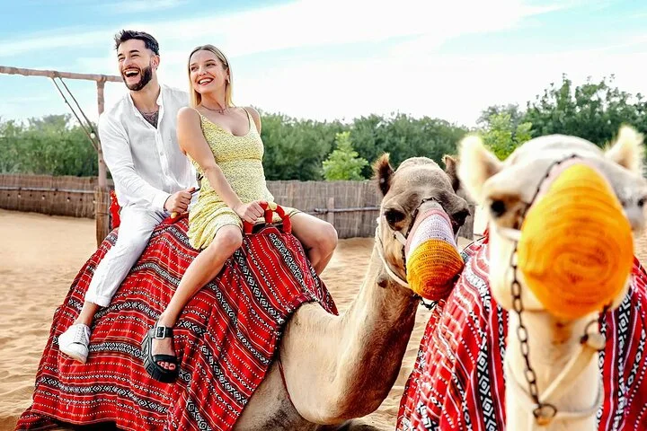 Quad Biking Dubai With Desert Safari Dune Bashing Camel Ride