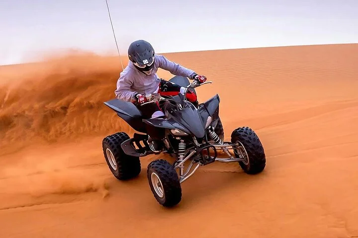 Quad Biking Dubai With Desert Safari Dune Bashing Camel Ride