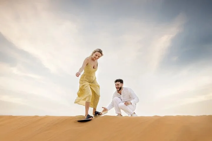 Quad Biking Dubai With Desert Safari Dune Bashing Camel Ride