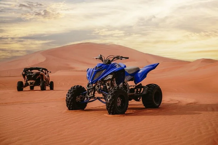 Quad Biking Dubai With Desert Safari Dune Bashing Camel Ride
