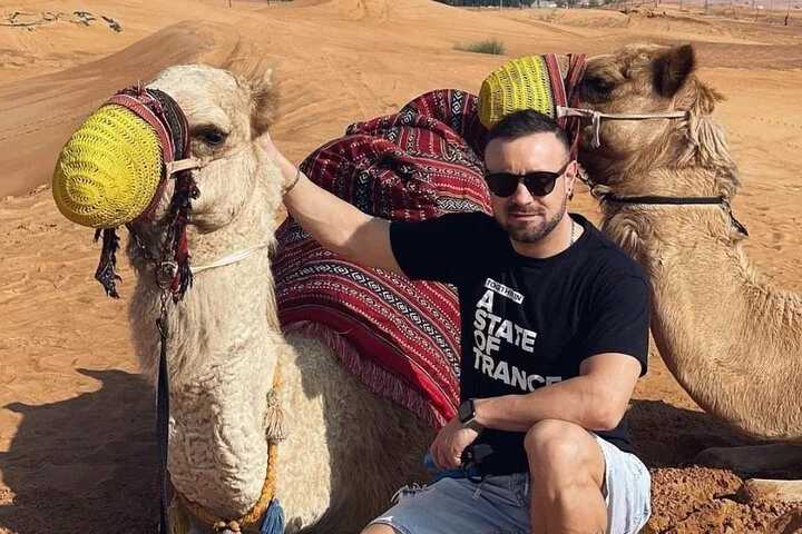 Red Dune Desert Safari Tour with Camel Ride & BBQ Experience