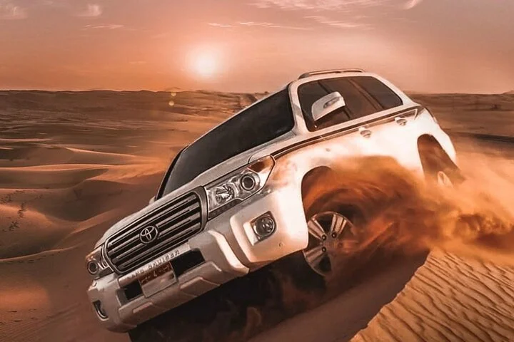 Red Dune Desert Safari Tour with Camel Ride & BBQ Experience