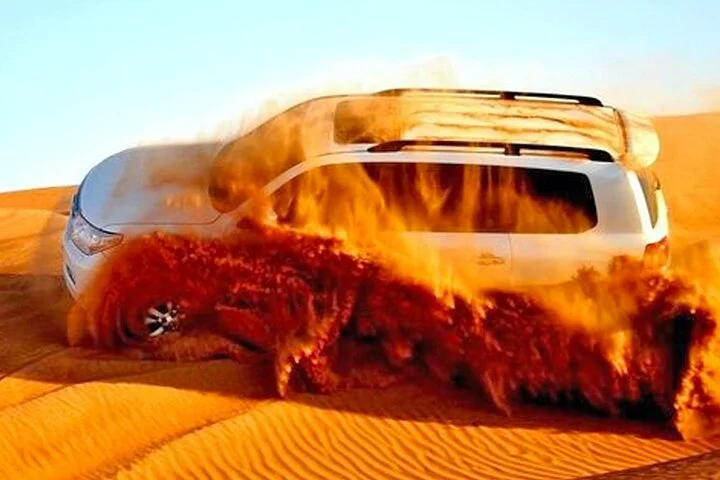 Red Dune Desert Safari with BBQ Dinner, Camel Ride & Live Shows