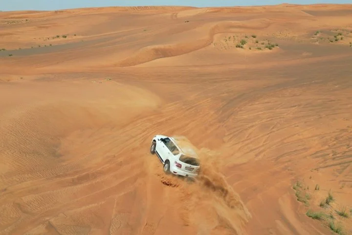 Red Dunes Desert Safari with Dune Bashing and BBQ Dinner