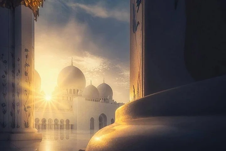 Sheikh Zayed Grand Mosque with Ferrari World from Dubai