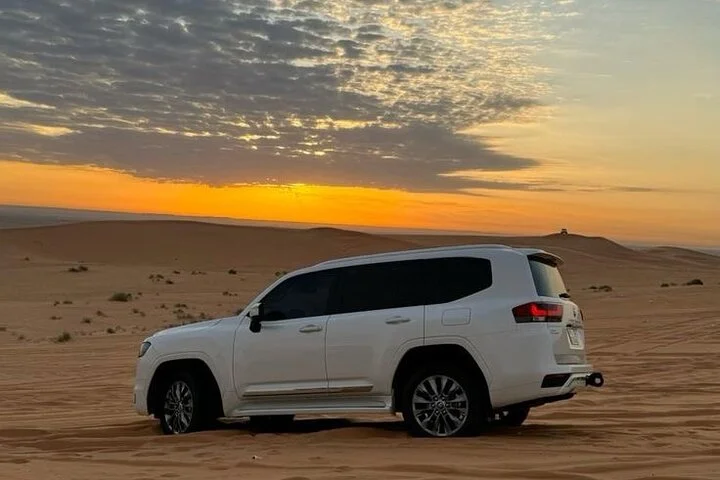 Sunset Desert Safari with Dune Bashing and Camel Rides Dinner