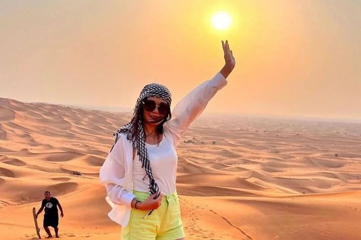 Sunset Desert Safari with Dune Bashing and Camel Rides Dinner