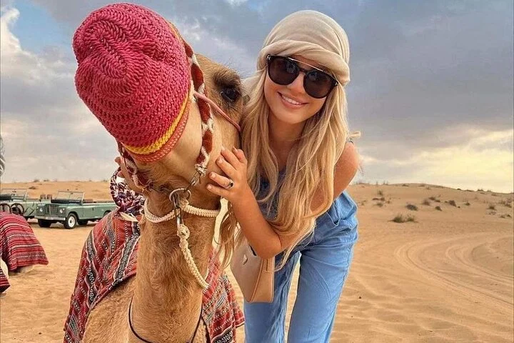 Sunset Desert Safari with Dune Bashing and Camel Rides Dinner