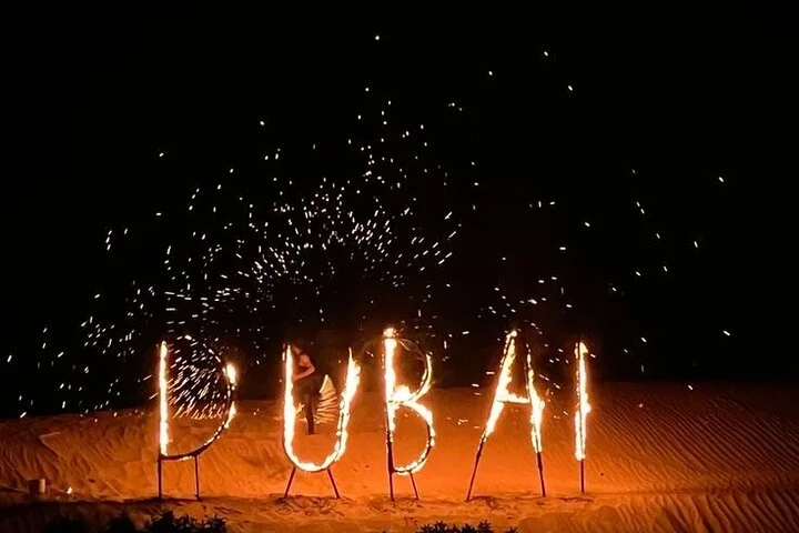 Sunset Desert Safari with Dune Bashing and Camel Rides Dinner