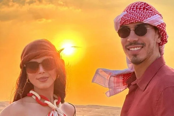 Sunset Desert Safari with Dune Bashing and Camel Rides Dinner