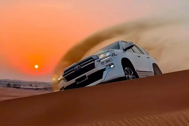 Sunset Desert Safari with Dune Bashing and Camel Rides Dinner