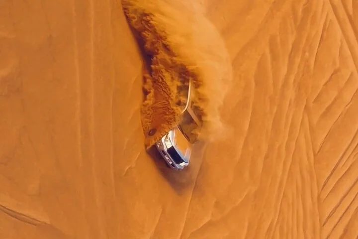 Thrilling dune bashing with VIP Desert camp delicious BBQ & shows